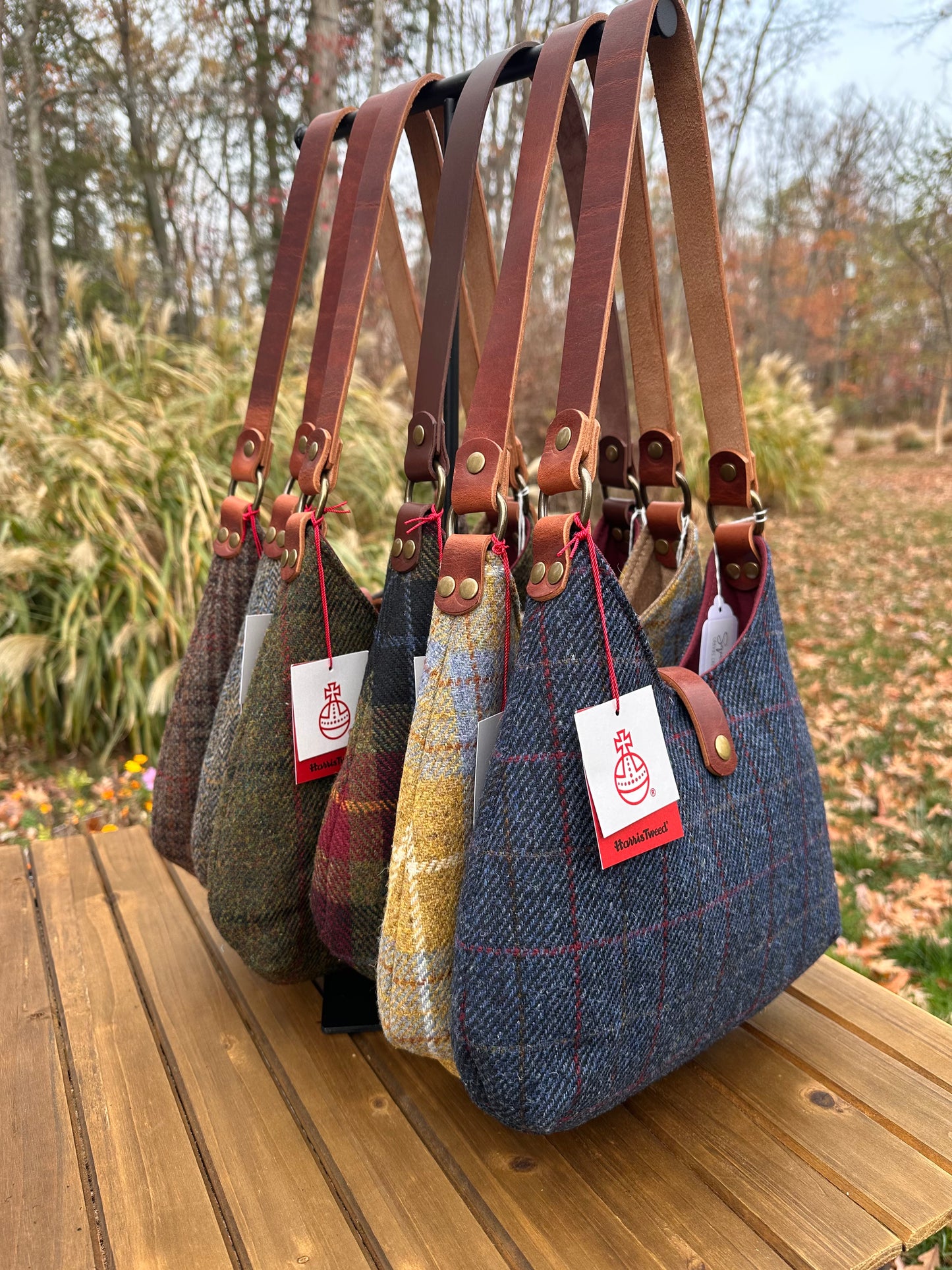 Harris Tweed® Rhode River Shoulder Bags six bags, with different prints and leather combos paired with Antique Brass Hardware. Handcrafted in Maryland