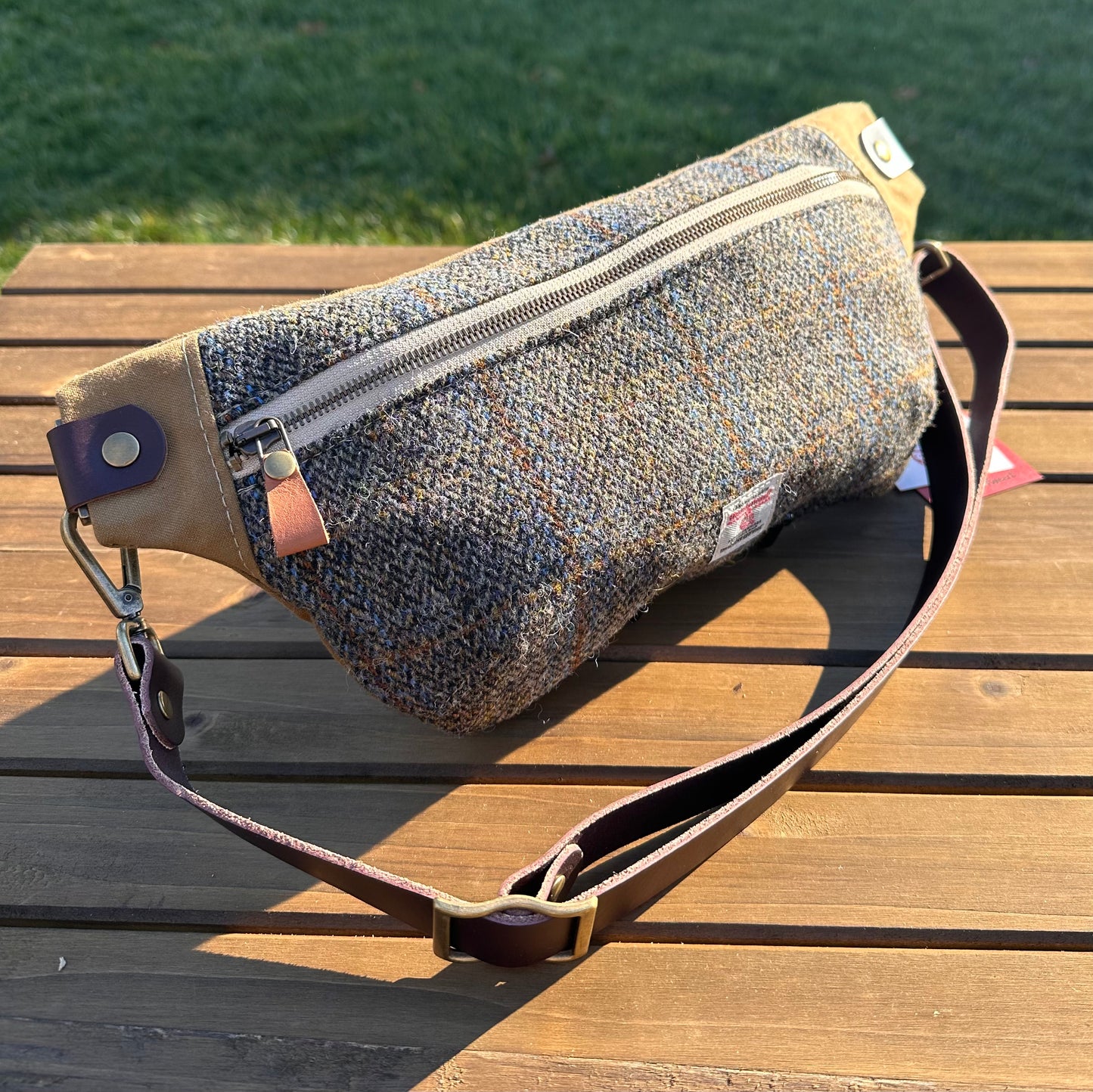 Blue and Green Herringbone with a Rust Overcheck Harris Tweed® Dark Brown Leather Strap Antique Brass Hardware Harris Tweed® Spinnaker Sling Bag squirescanvascreations.com