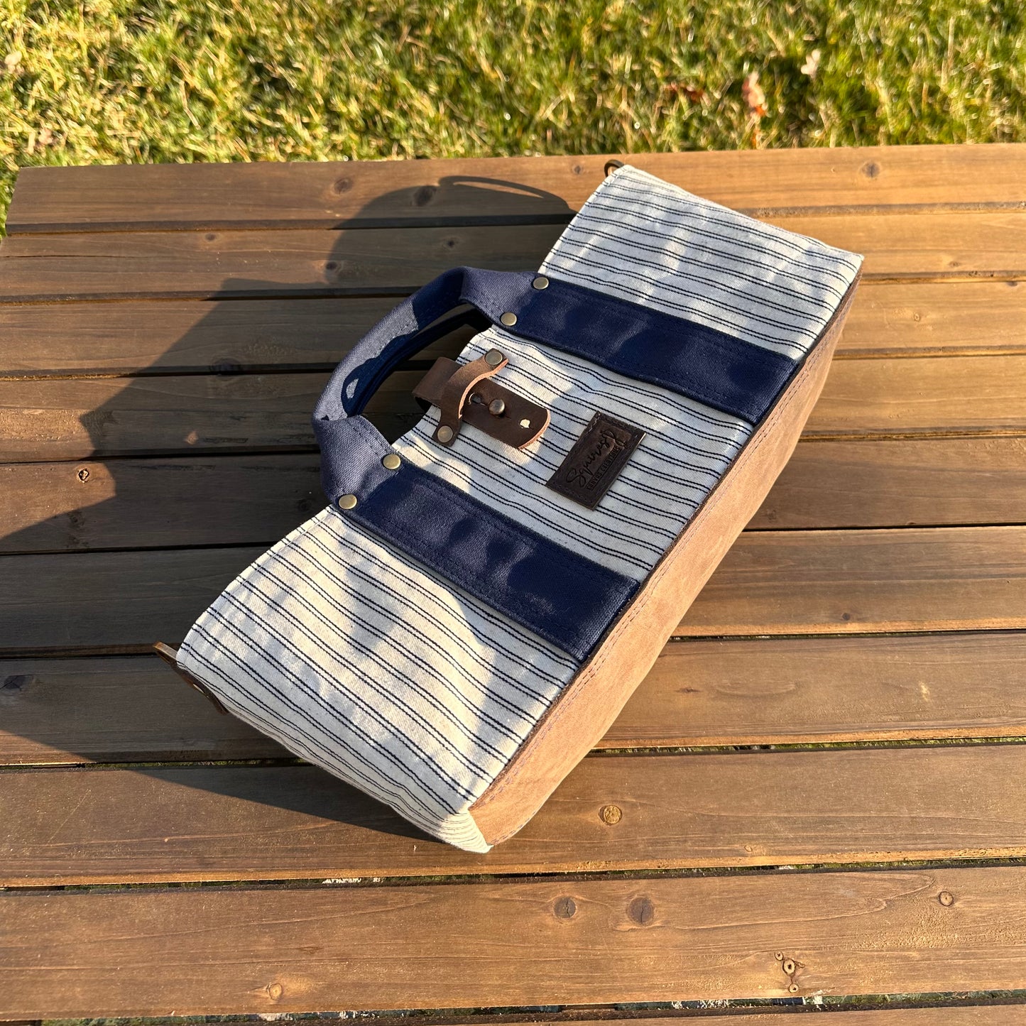 Navy Stripe Waxed Canvas and Crazy Horse Tan Leather with Antique Brass Hardware Waterman Tote squirescanvascreations.com