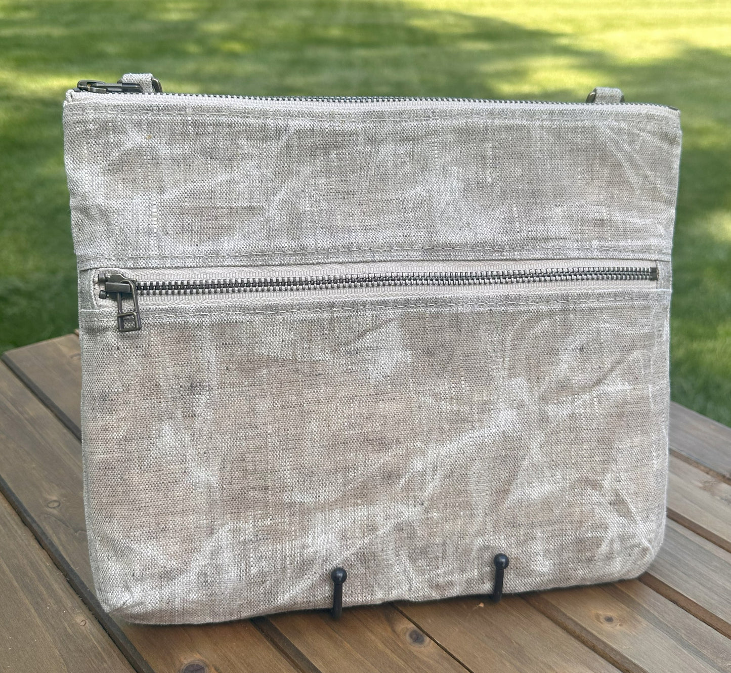 Front View Handcrafted Canvas Bayside Slim Crossbody Bag in Waxed Linen canvas with cotton canvas lining and adjustable Splenda vegetable-tanned leather strap. Lightweight and perfect for everyday wear.