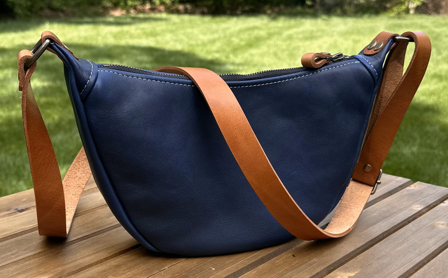 Windward Sling Ink Blue Washed Horween Leather with Cognac Splenda Leather Strap and Antique Brass Hardware squirescanvascreations.com