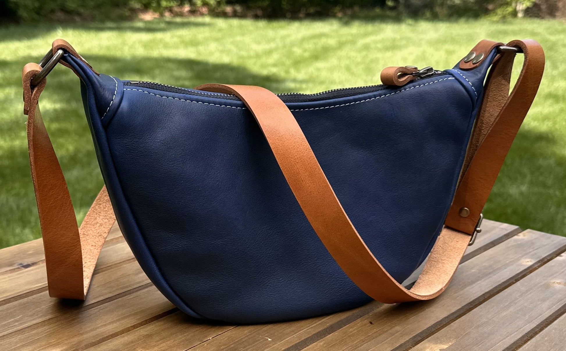 Windward Sling Ink Blue Washed Horween Leather with Cognac Splenda Leather Strap and Antique Brass Hardware squirescanvascreations.com