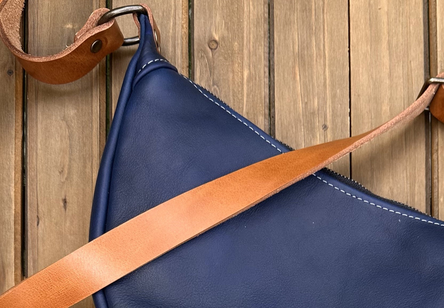 Windward Sling Ink Blue Washed Horween Leather with Cognac Splenda Leather Strap and Antique Brass Hardware squirescanvascreations.com