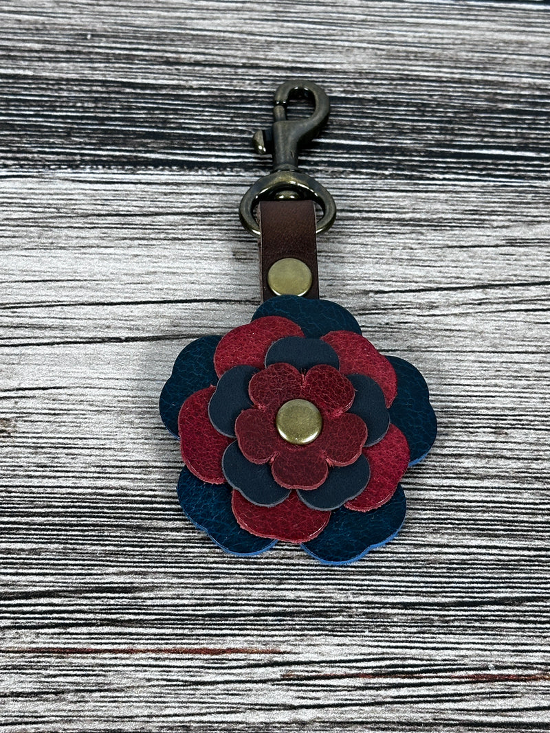 Close up Leather flower handbag charm with swivel hook.