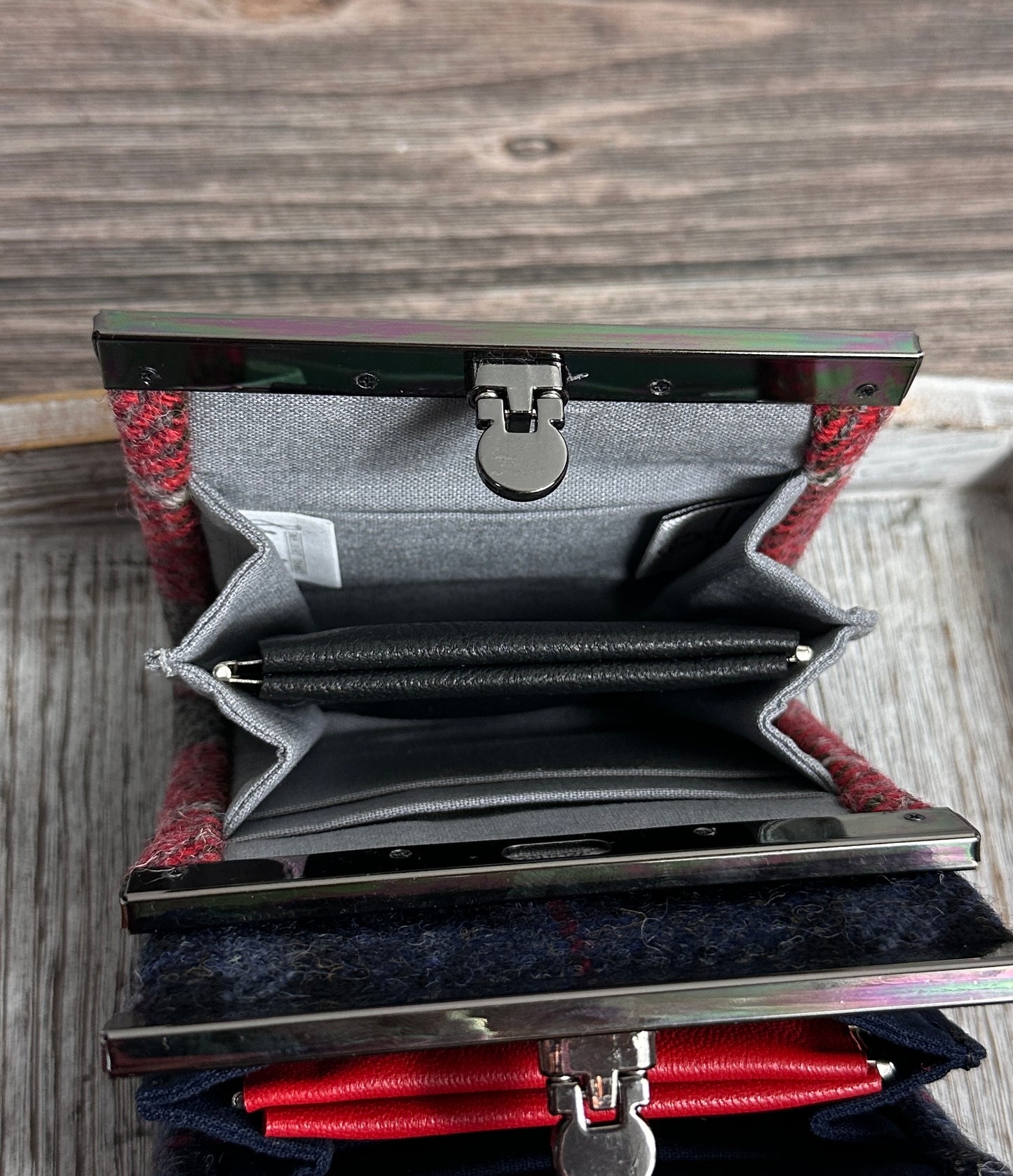 Open Mini Harris Tweed® Rock Hall Wallet showing the linen interior, two card slots, and the removable coin pocket in a slim accordion-style design.