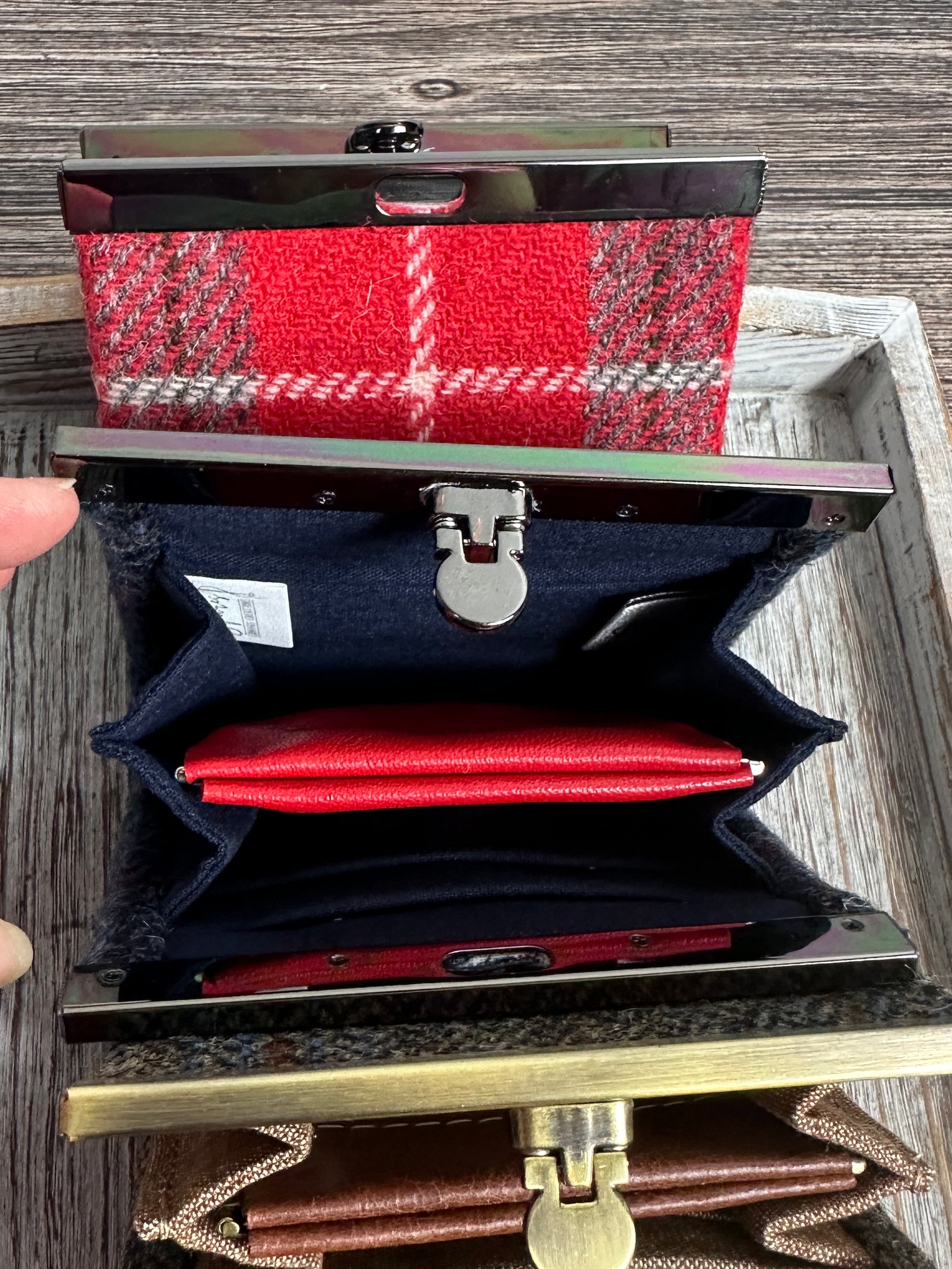 Open Mini Harris Tweed® Rock Hall Wallet showing the linen interior, two card slots, and the removable coin pocket in a slim accordion-style design.