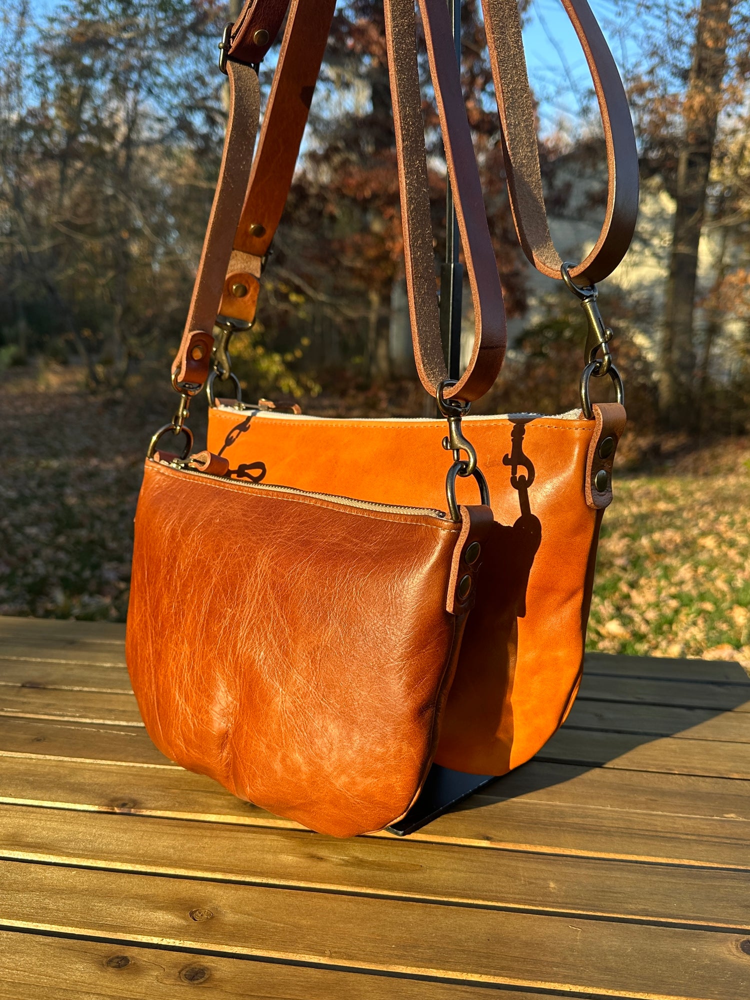 Collection of Holland Island Crossbody bags Sienna Leather and Acorn Leather,