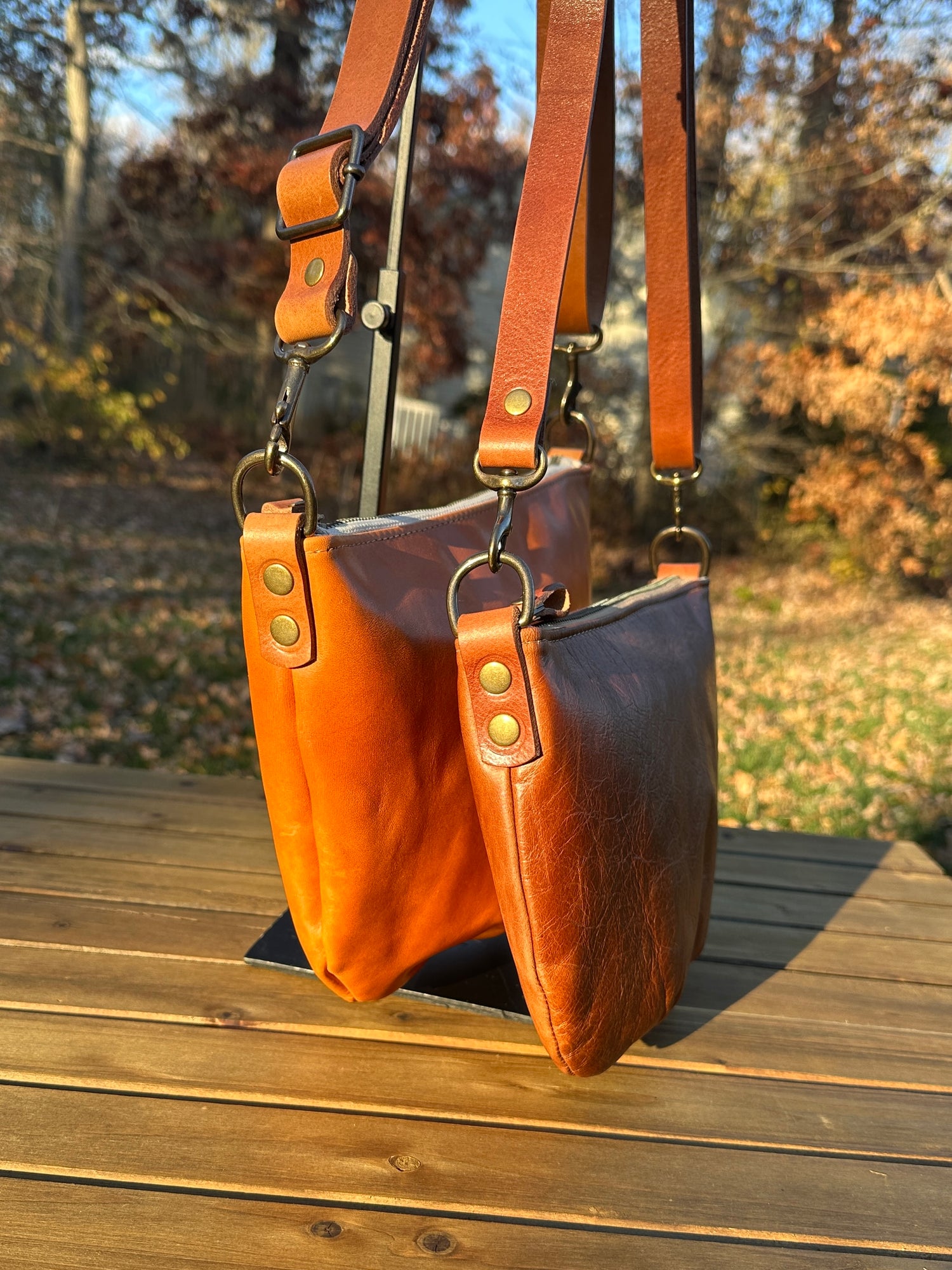 Collection of Holland Island Crossbody bags Sienna Leather and Acorn Leather,