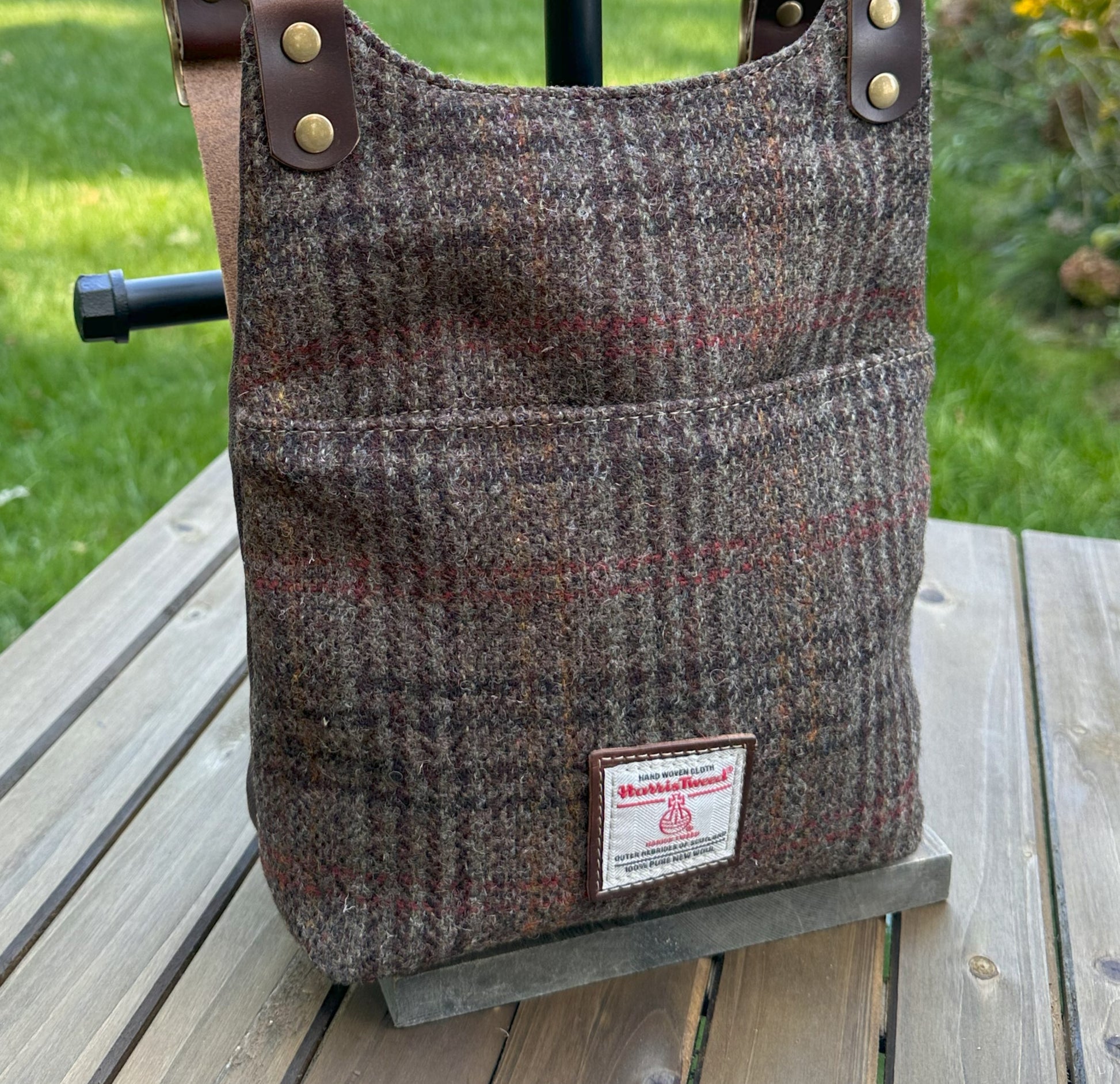 Dark Brown Plaid Harris Tweed® and Dark Brown Waxed Canvas back with Solid Brass Hardware Harris Tweed® Eastport Backpack squirescanvascreations.com