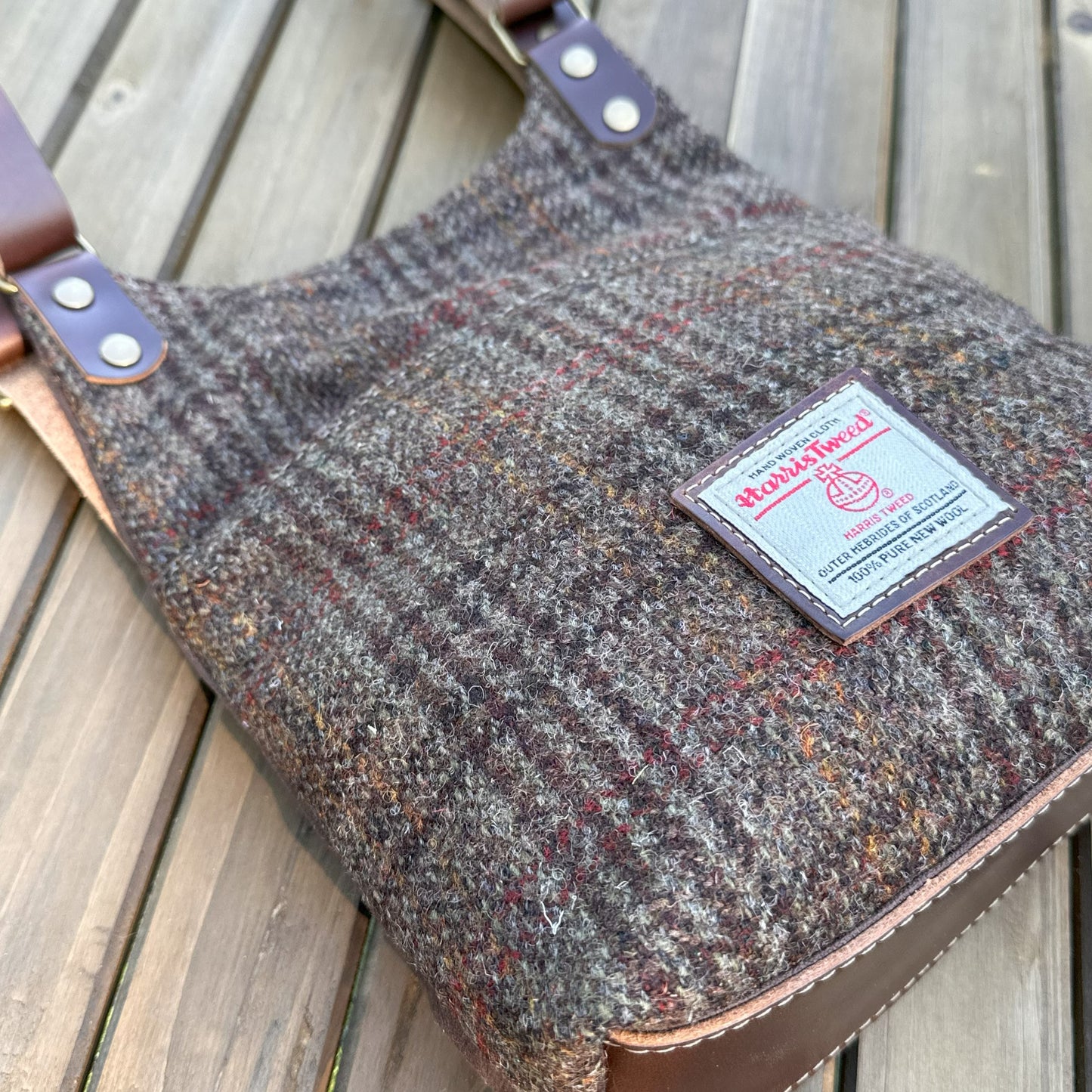 Dark Brown Plaid Harris Tweed® and Dark Brown Waxed Canvas back with Solid Brass Hardware Harris Tweed® Eastport Backpack squirescanvascreations.com