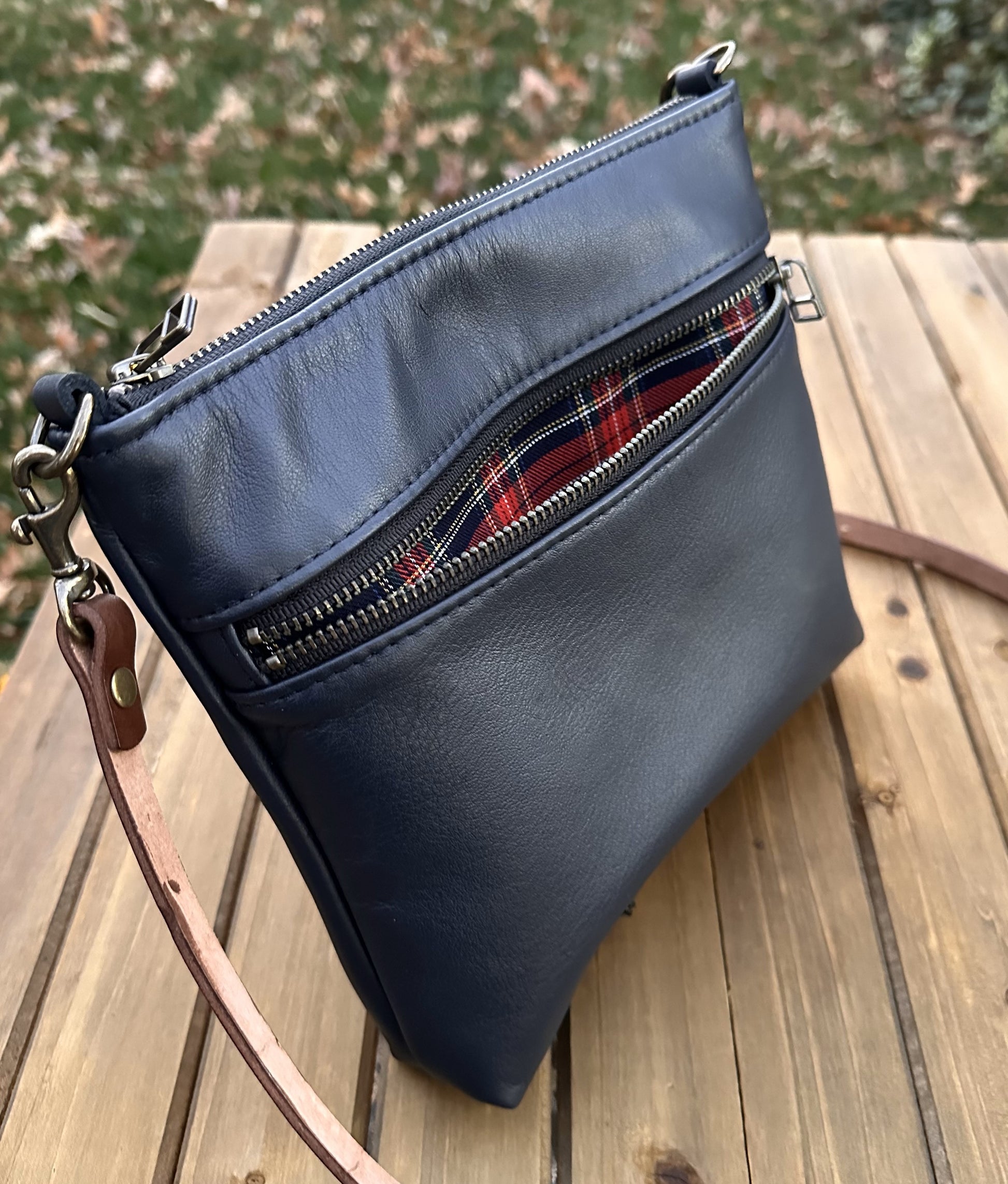 Navy Leather Fairhaven Crossbody with Antique Brass Hardware and Dark Brown Italian Venchetta Leather Strap SquiresCanvasCreations.com