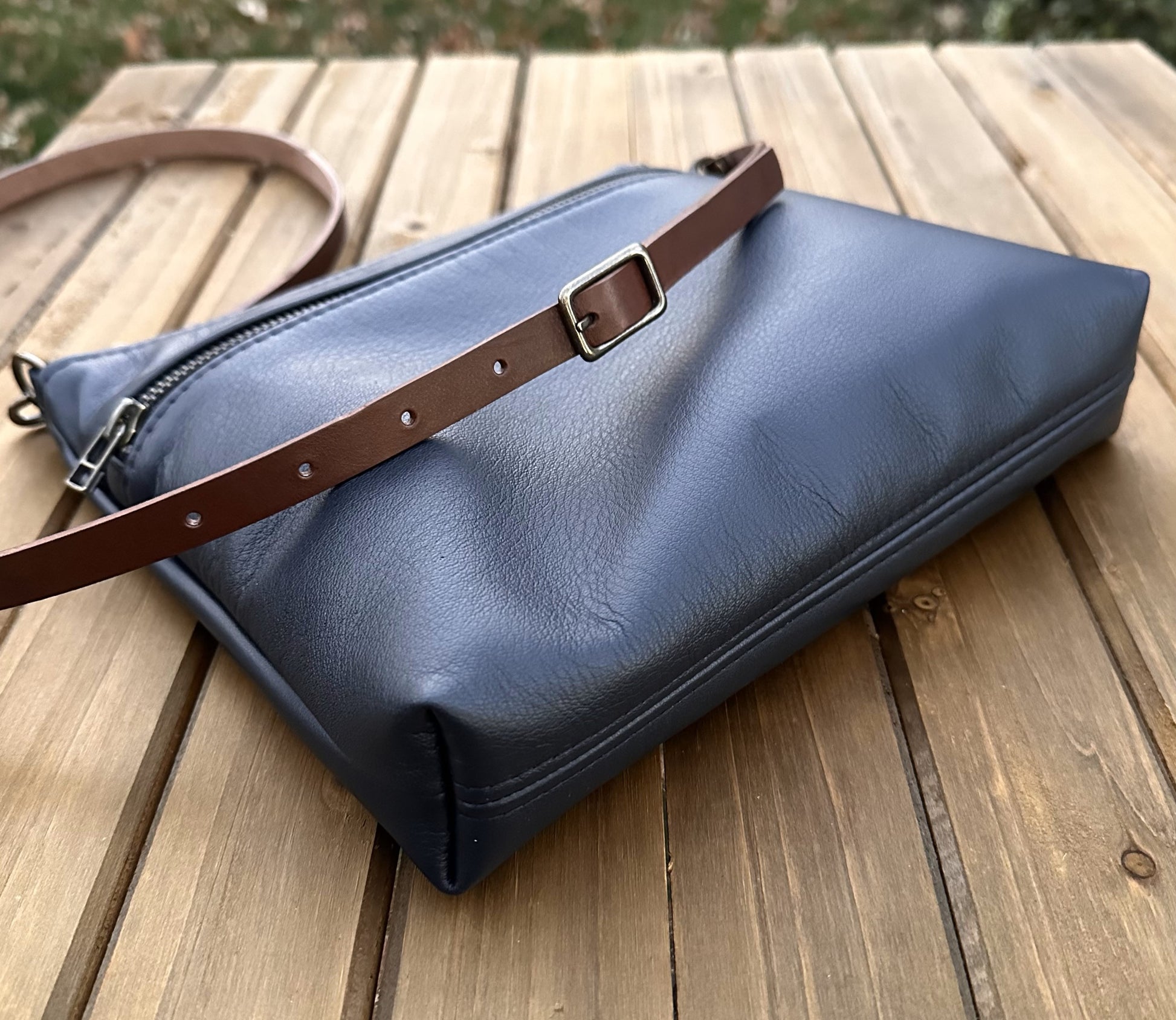 Navy Leather Fairhaven Crossbody with Antique Brass Hardware and Dark Brown Italian Venchetta Leather Strap SquiresCanvasCreations.com