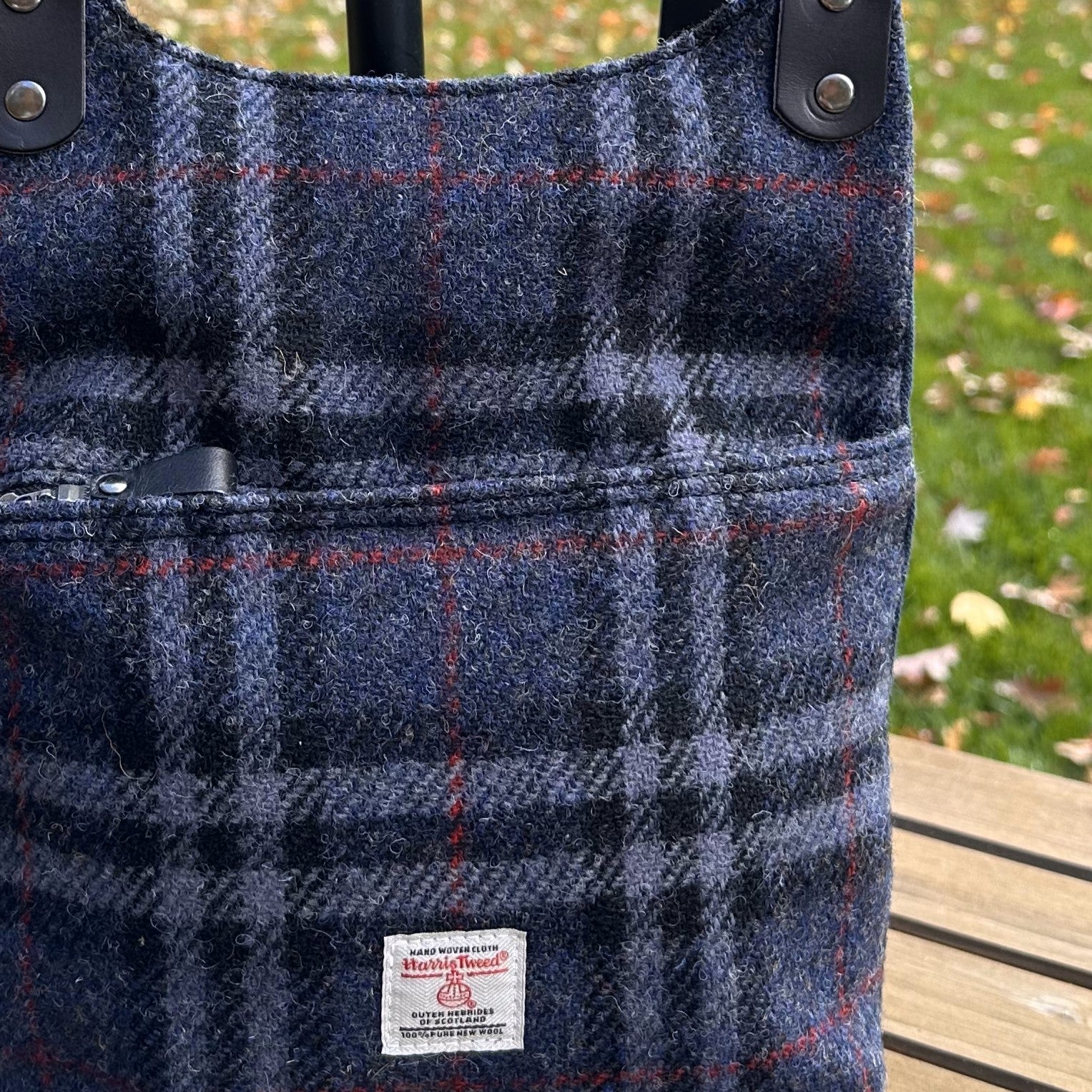 Blue Black and Grey Tartan with Red Overcheck Harris Tweed® and Dark Navy Waxed Canvas back with Solid Brass Hardware Harris Tweed® Eastport Backpack squirescanvascreations.com
