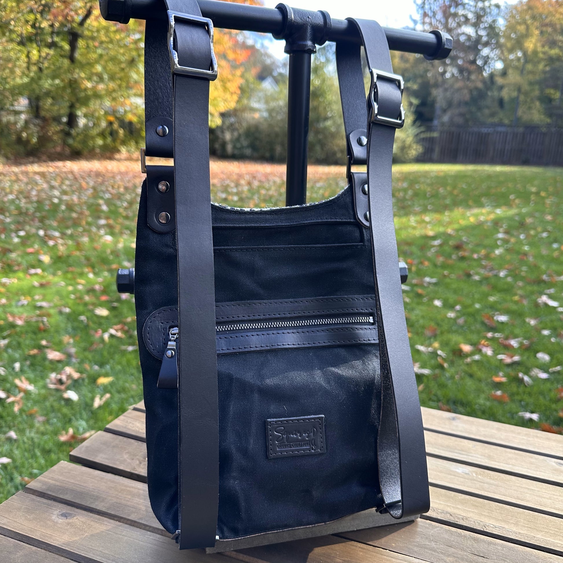 Black and White Houndstooth Harris Tweed® and Black Waxed Canvas back with Solid Brass Hardware Harris Tweed® Eastport Backpack squirescanvascreations.com