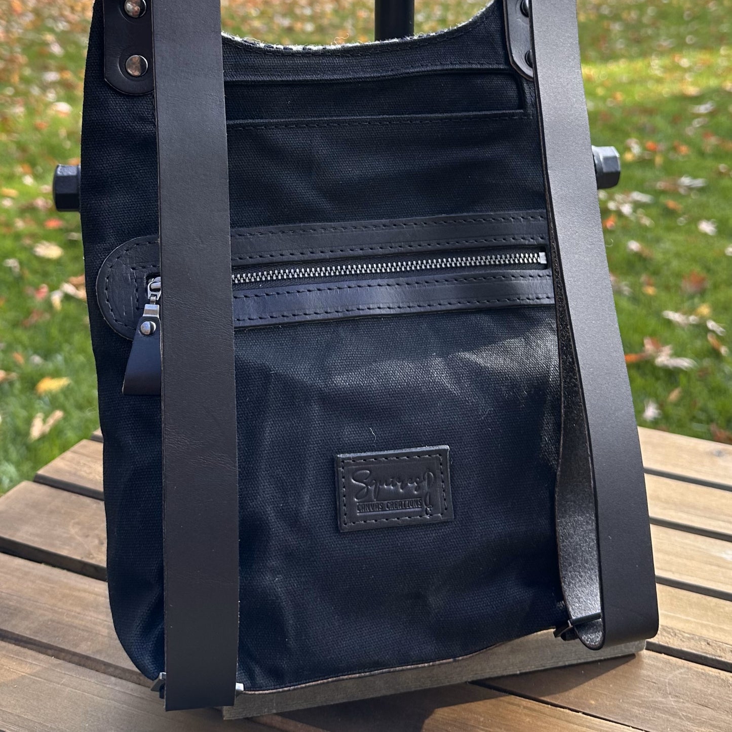 Black and White Houndstooth Harris Tweed® and Black Waxed Canvas back with Solid Brass Hardware Harris Tweed® Eastport Backpack squirescanvascreations.com