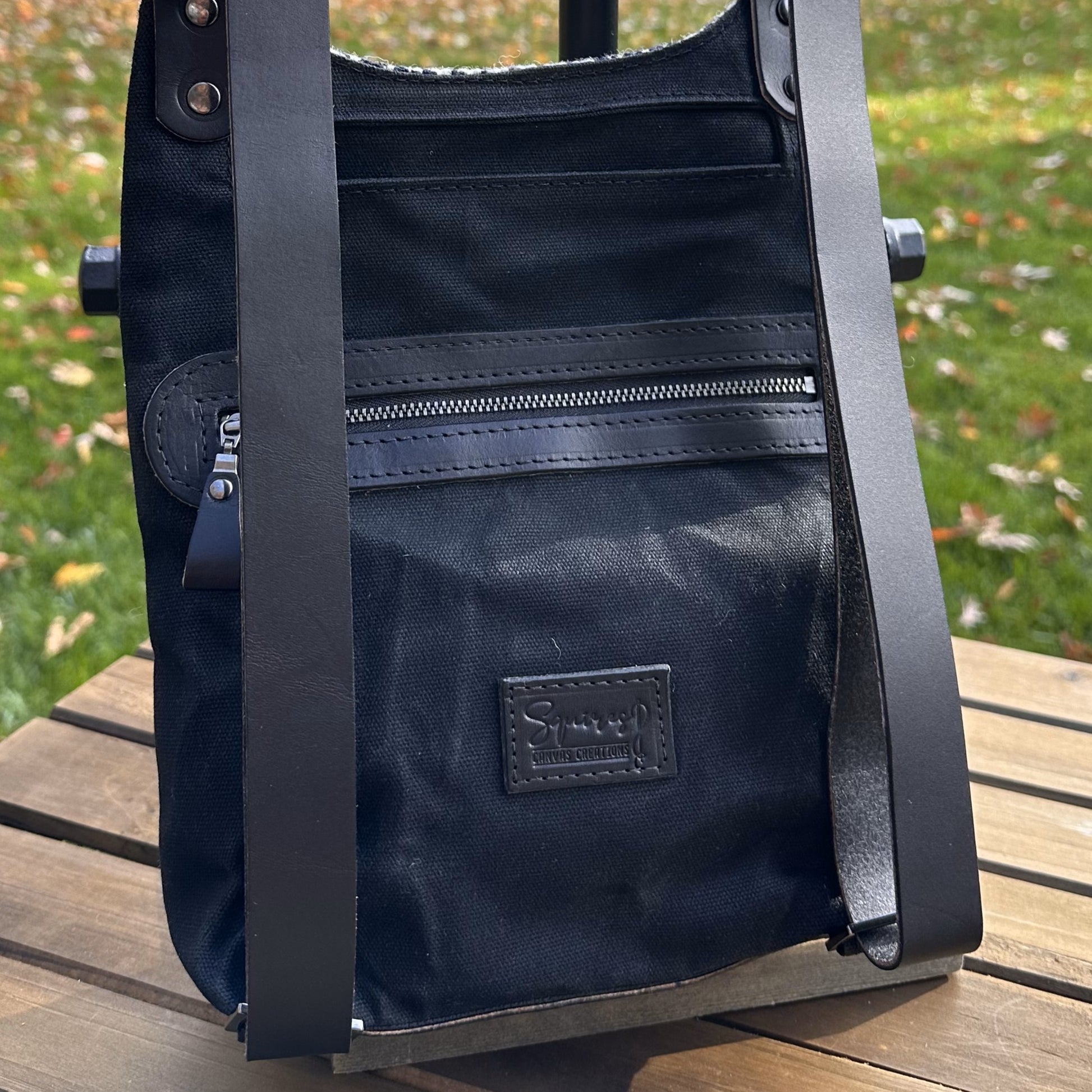Black and White Houndstooth Harris Tweed® and Black Waxed Canvas back with Solid Brass Hardware Harris Tweed® Eastport Backpack squirescanvascreations.com