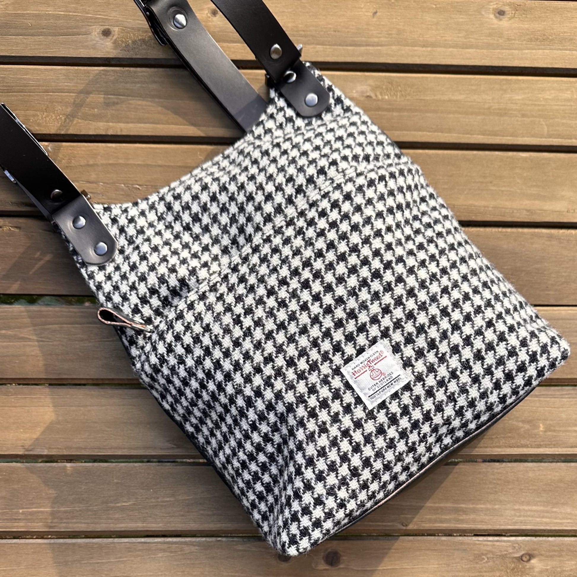 Black and White Houndstooth Harris Tweed® and Black Waxed Canvas back with Solid Brass Hardware Harris Tweed® Eastport Backpack squirescanvascreations.com