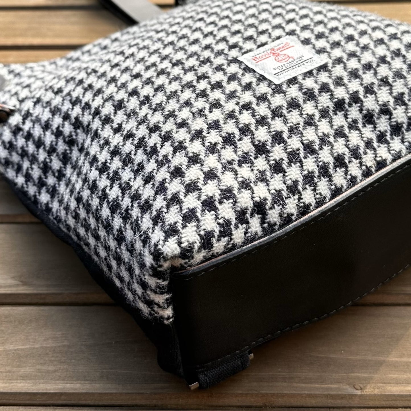 Black and White Houndstooth Harris Tweed® and Black Waxed Canvas back with Solid Brass Hardware Harris Tweed® Eastport Backpack squirescanvascreations.com