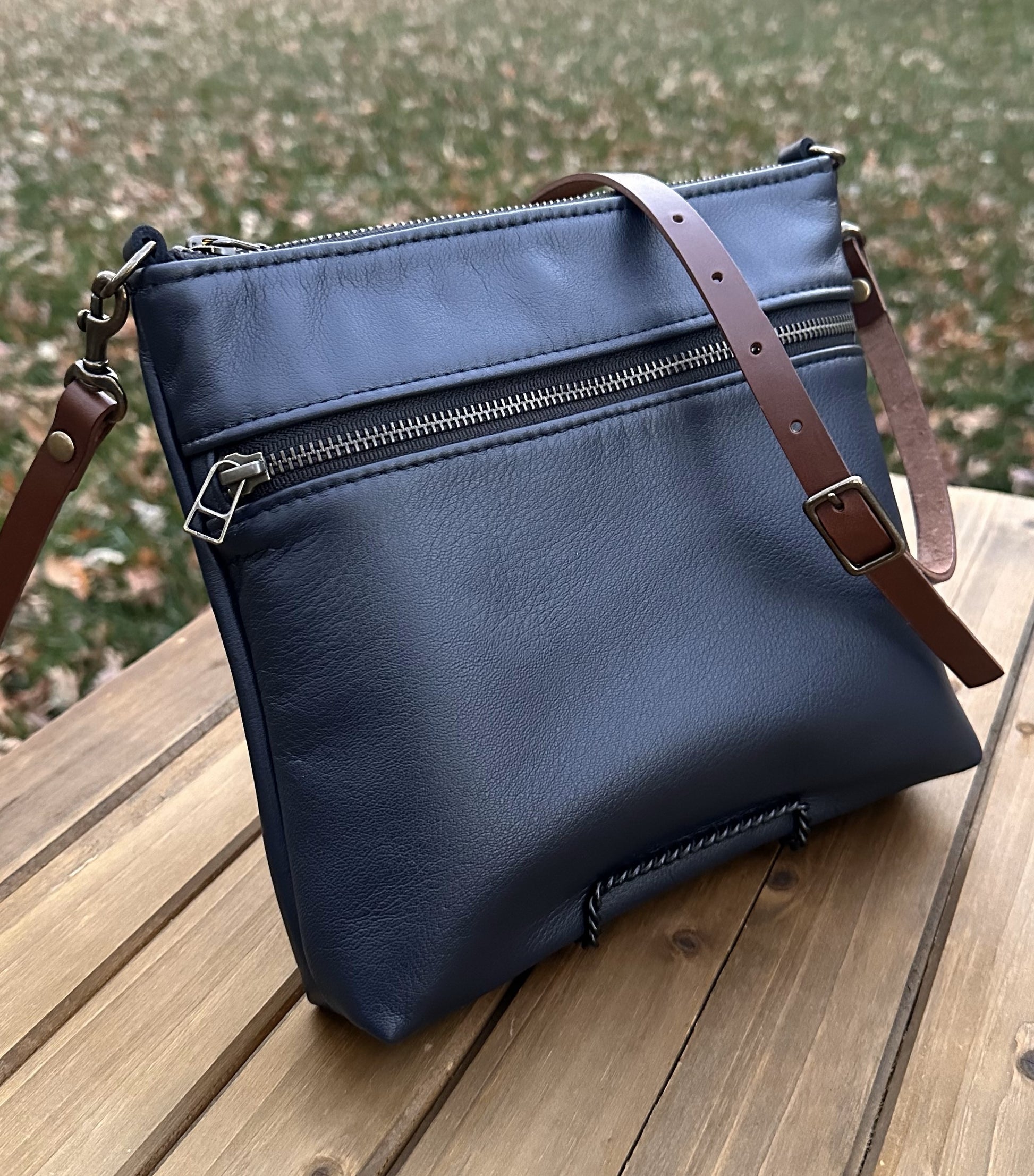 Navy Leather Fairhaven Crossbody with Antique Brass Hardware and Dark Brown Italian Venchetta Leather Strap SquiresCanvasCreations.com
