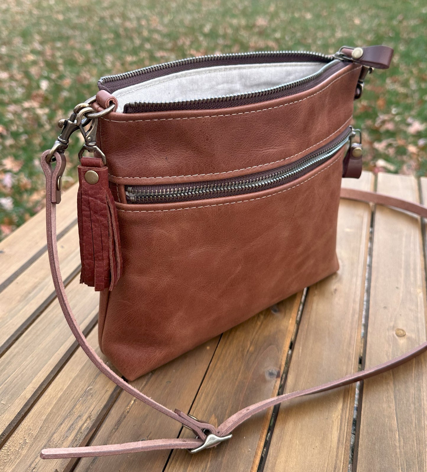 Brandy Leather Fairhaven Crossbody with Antique Brass Hardware and Dark Brown Italian Venchetta Leather Strap SquiresCanvasCreations.com