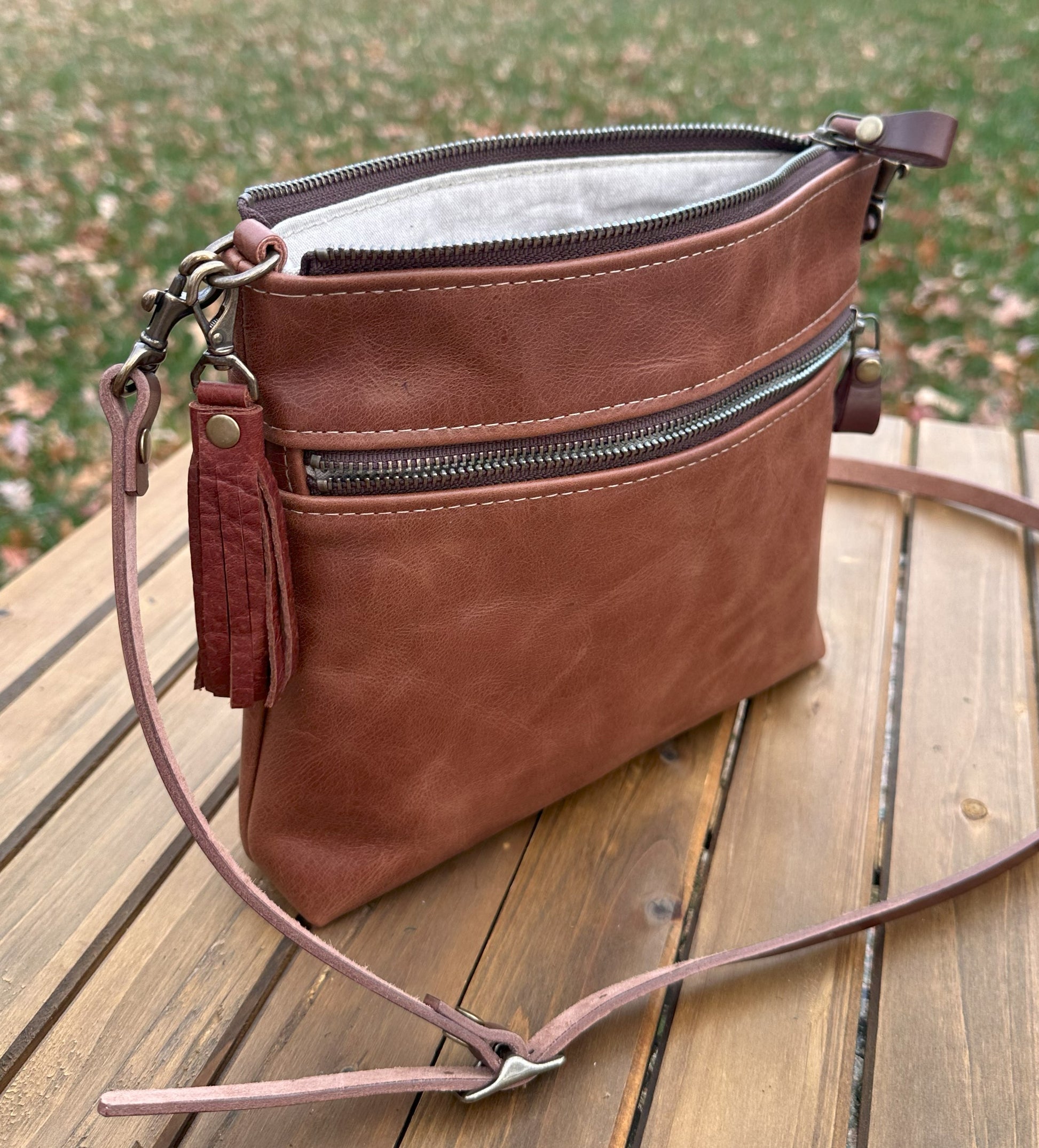 Brandy Leather Fairhaven Crossbody with Antique Brass Hardware and Dark Brown Italian Venchetta Leather Strap SquiresCanvasCreations.com