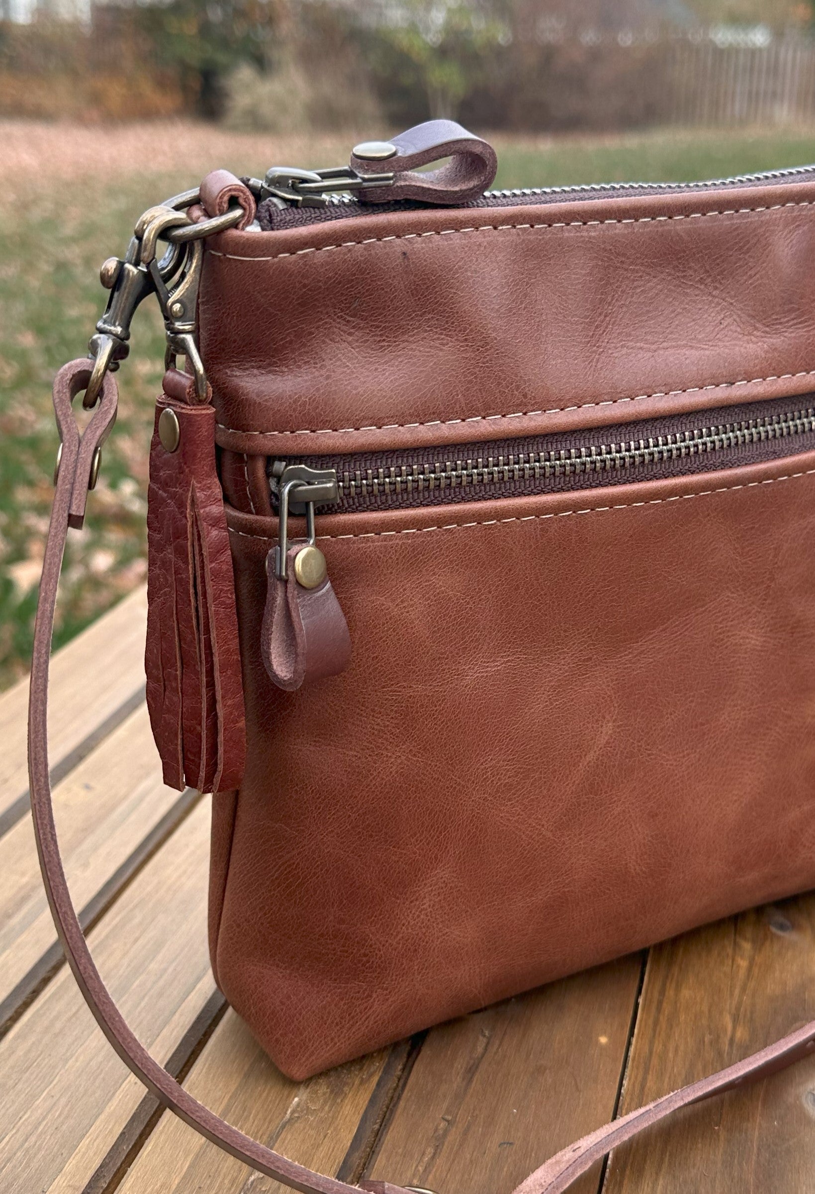 Brandy Leather Fairhaven Crossbody with Antique Brass Hardware and Dark Brown Italian Venchetta Leather Strap SquiresCanvasCreations.com