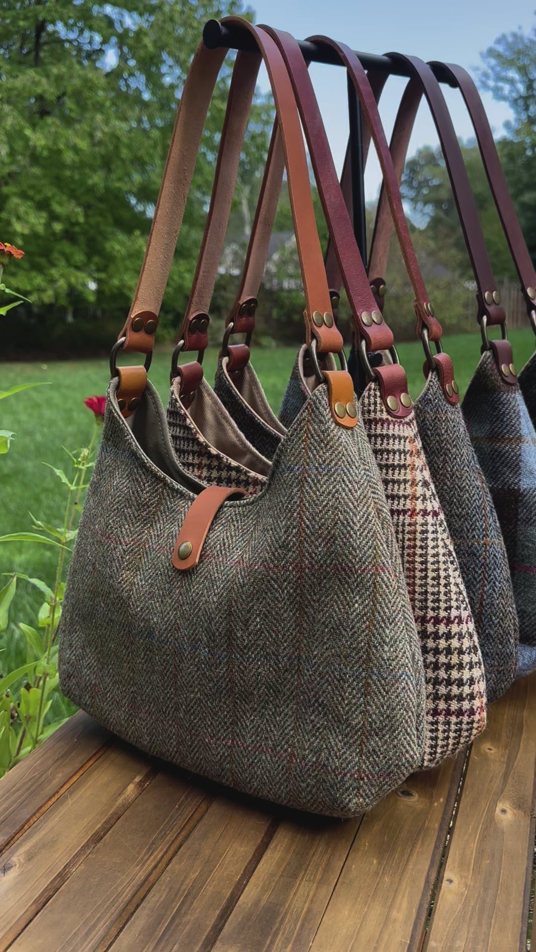 Harris Tweed® Rhode River Shoulder Bags six bags, with different prints and leather combos paired with Antique Brass Hardware. Handcrafted in Maryland