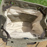 Olive Drab Stone Washed Canvas with and Antique Brass Hardware and Dark Brown Webbing Strap and Natural Canvas interior Spa Creek Bucket Convertible Bag squirescanvascreations.com