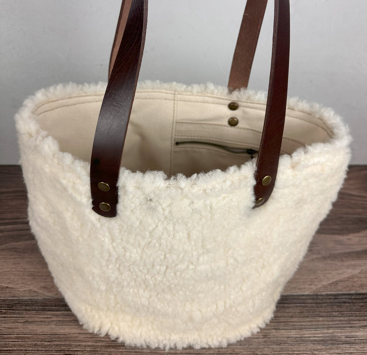 Parker Creek Tote Sheep Shearling with 15oz Natural Canvas with Cognac Splenda Leather and Antique Brass Hardware SquiresCanvasCreations.com