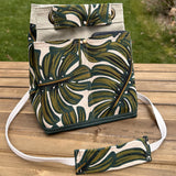 Monstera Canvas with Forest Green Duck Canvas and Antique Brass Hardware and Natural Webbing Strap and Natural Canvas interior Spa Creek Bucket Convertible Bag squirescanvascreations.com