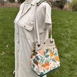 Camont Poppy Fields Canvas with Teal Green Duck Canvas and Antique Brass Hardware and Natural Webbing Strap and Natural Canvas Spa Creek Bucket Convertible Bag squirescanvascreations.com