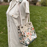 Amalfi-Herb Garden Canvas with Forest Green Duck Canvas and Antique Brass Hardware and Natural Webbing Strap and Natural Canvas interior Spa Creek Bucket Convertible Bag squirescanvascreations.com