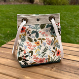 Amalfi-Herb Garden Canvas with Forest Green Duck Canvas and Antique Brass Hardware and Natural Webbing Strap and Natural Canvas interior Spa Creek Bucket Convertible Bag squirescanvascreations.com