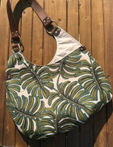 Compass Rose Shoulder Bag in Rifle Paper Monstera Canvas with Dark Brown Leather.