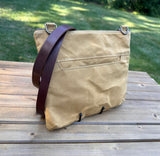 Back View Handcrafted Canvas Bayside Slim Crossbody Bag in Sandstone Hybrid waxed canvas with cotton canvas lining and adjustable Splenda vegetable-tanned leather strap. Lightweight and perfect for everyday wear.