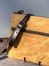 Up Close Front View Handcrafted Canvas Bayside Slim Crossbody Bag in Honey Waxed Corduroy with cotton canvas lining and adjustable Splenda vegetable-tanned leather strap. Lightweight and perfect for everyday wear.