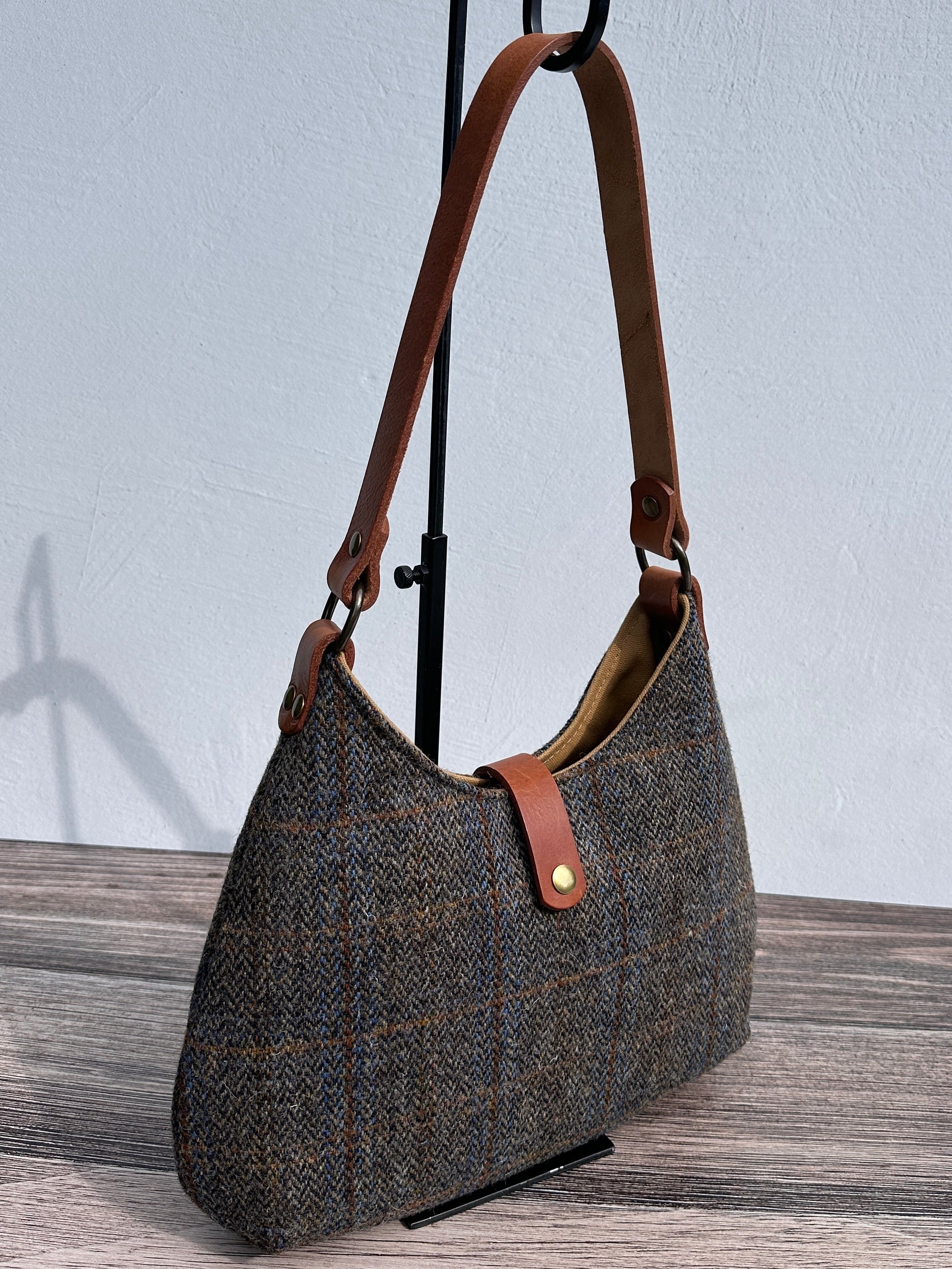 Front View Green & Blue Herringbone Harris Tweed® Rhode River Shoulder Bags,  Cognac Leather with Antique Brass Hardware. Handcrafted in Maryland