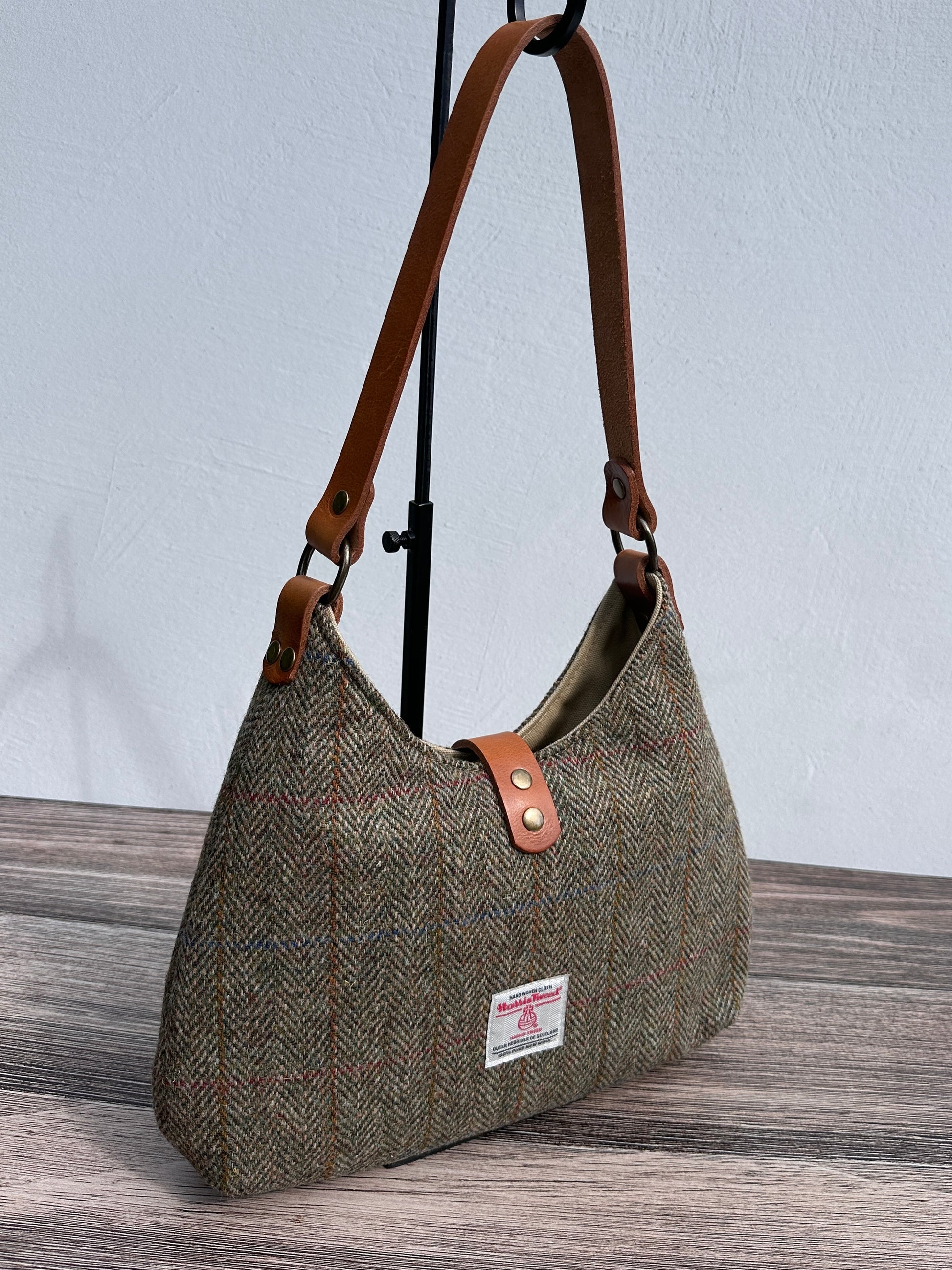 Back view Green Mix Herringbone Harris Tweed® Rhode River Shoulder Bags,  Cognac Leather with Antique Brass Hardware. Handcrafted in Maryland