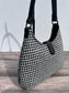 Close up view Black and White Houndstooth Harris Tweed® Rhode River Shoulder Bags,  Black Leather with Black Matte Hardware. Handcrafted in Maryland