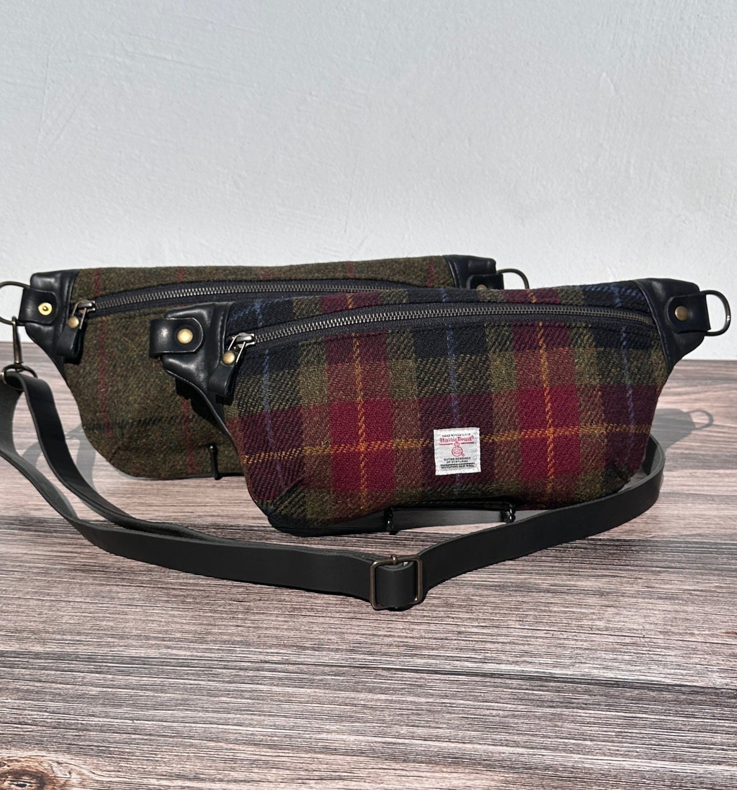 Luxury Harris Tweed® and leather sling bag, handcrafted in Maryland with timeless design.