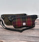 Luxury Harris Tweed® and leather sling bag, handcrafted in Maryland with timeless design.