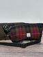 Luxury Green, Red and Black plaid Harris Tweed® and leather sling bag, handcrafted in Maryland with timeless design.