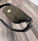 Minimalist sling bag handcrafted with Olive plaid Harris Tweed® and Horween Black Leather, finished with Antique Brass hardware.