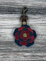 Close up Leather flower handbag charm with swivel hook.