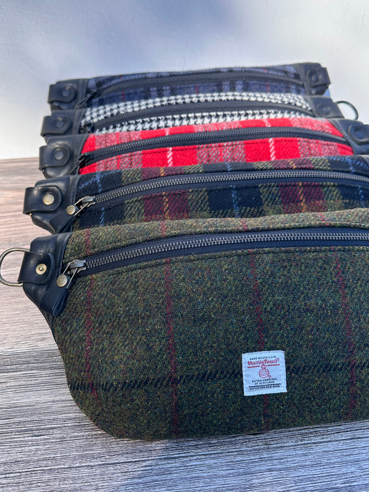 Luxury Harris Tweed® and leather sling bag, handcrafted in Maryland with timeless design.