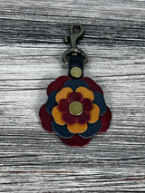 Close up Leather flower handbag charm with swivel hook.