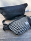 Luxury Black and White Houndstooth  Harris Tweed® and leather sling bag, handcrafted in Maryland with timeless design.
