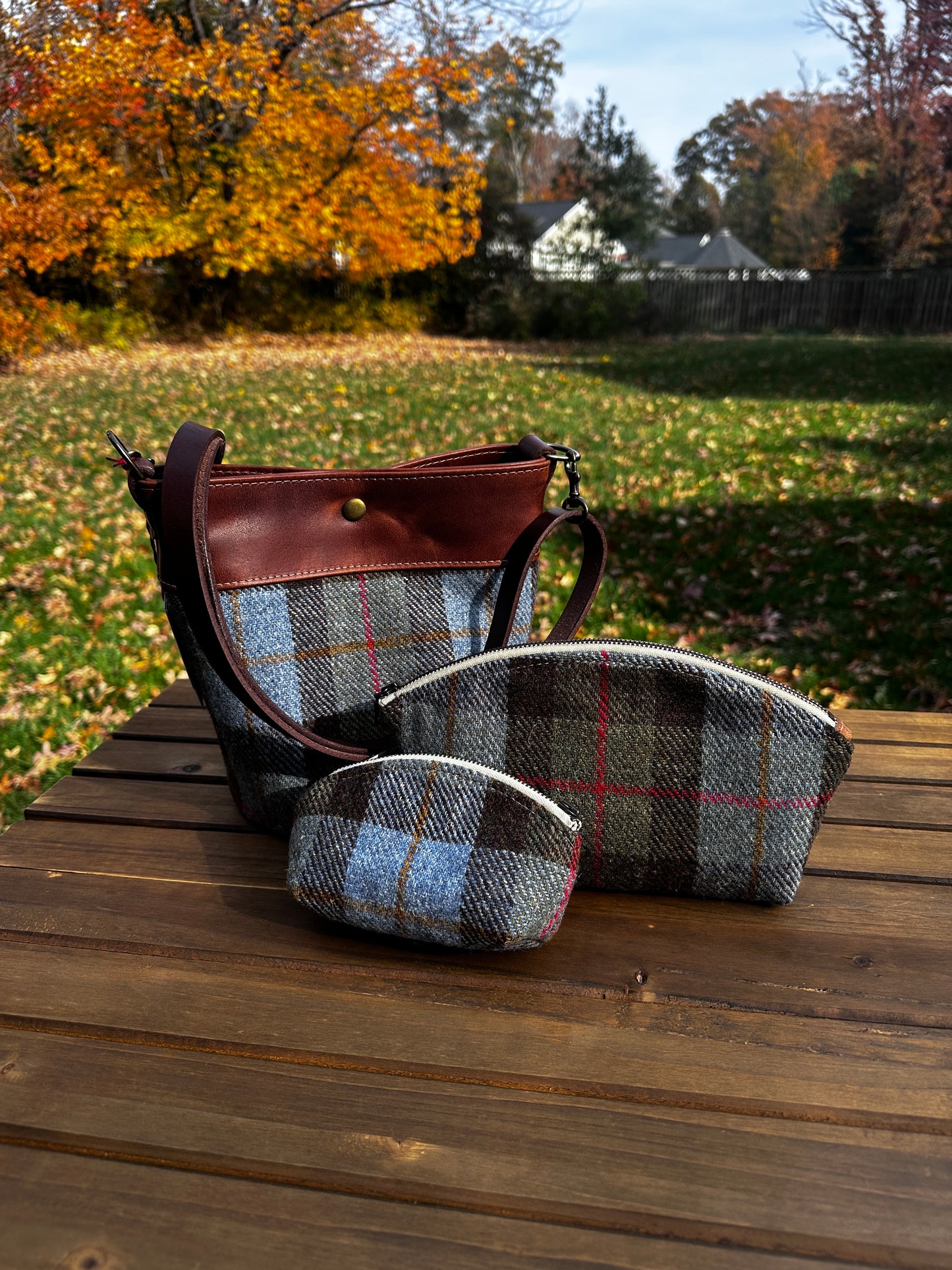 Harris Tweed® Lighthouse Crossbody round bag with flat bottom and matching Seashell Pouch