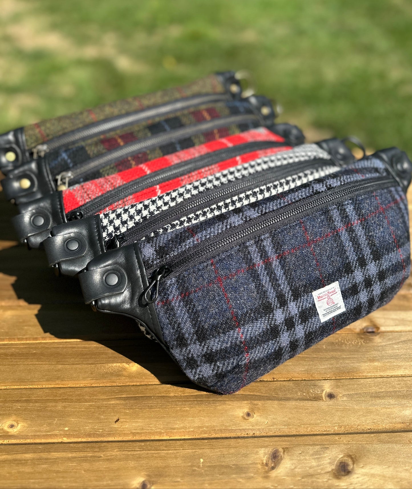 Luxury Harris Tweed® and leather sling bag, handcrafted in Maryland with timeless design.