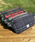 Luxury Harris Tweed® and leather sling bag, handcrafted in Maryland with timeless design.